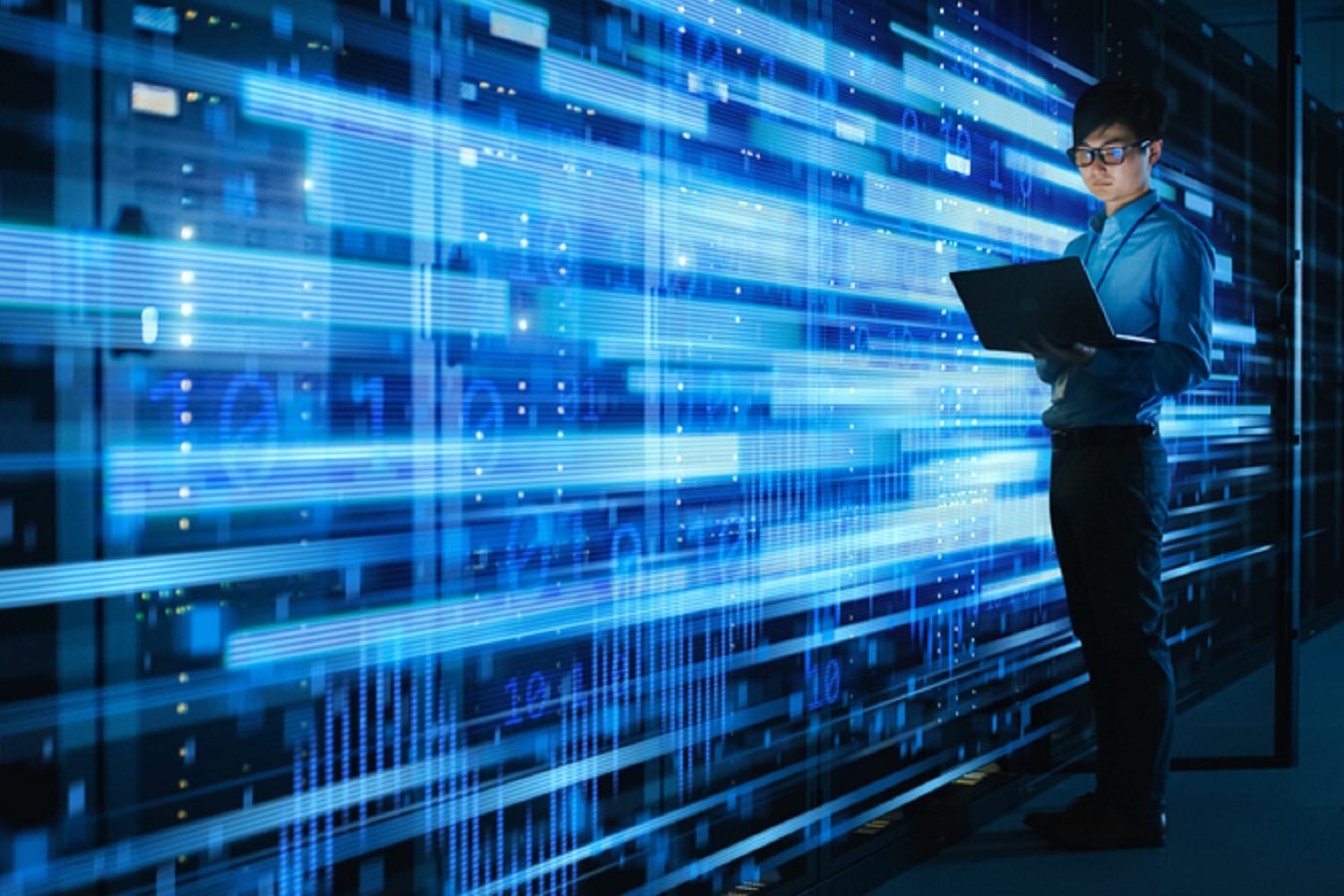 Shot of Asian IT Specialist Using Laptop in Data Center Full of Rack Servers. Concept of High Speed Internet Connections with Blue Visualization Projection of Binary Data Transfer hızlı sayım görsel